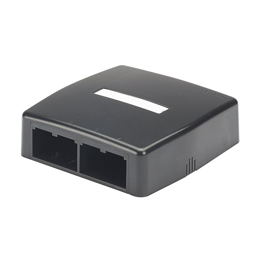 Mini Com® yüzey kutusu monte dört Mini Com® modüllerini kabul eder. hızlı bırakma kapağı dahildir. kablo bağları, yapışkan arkalık, etiket ve etiket kapak ile temin edilmektedir. Siyah.